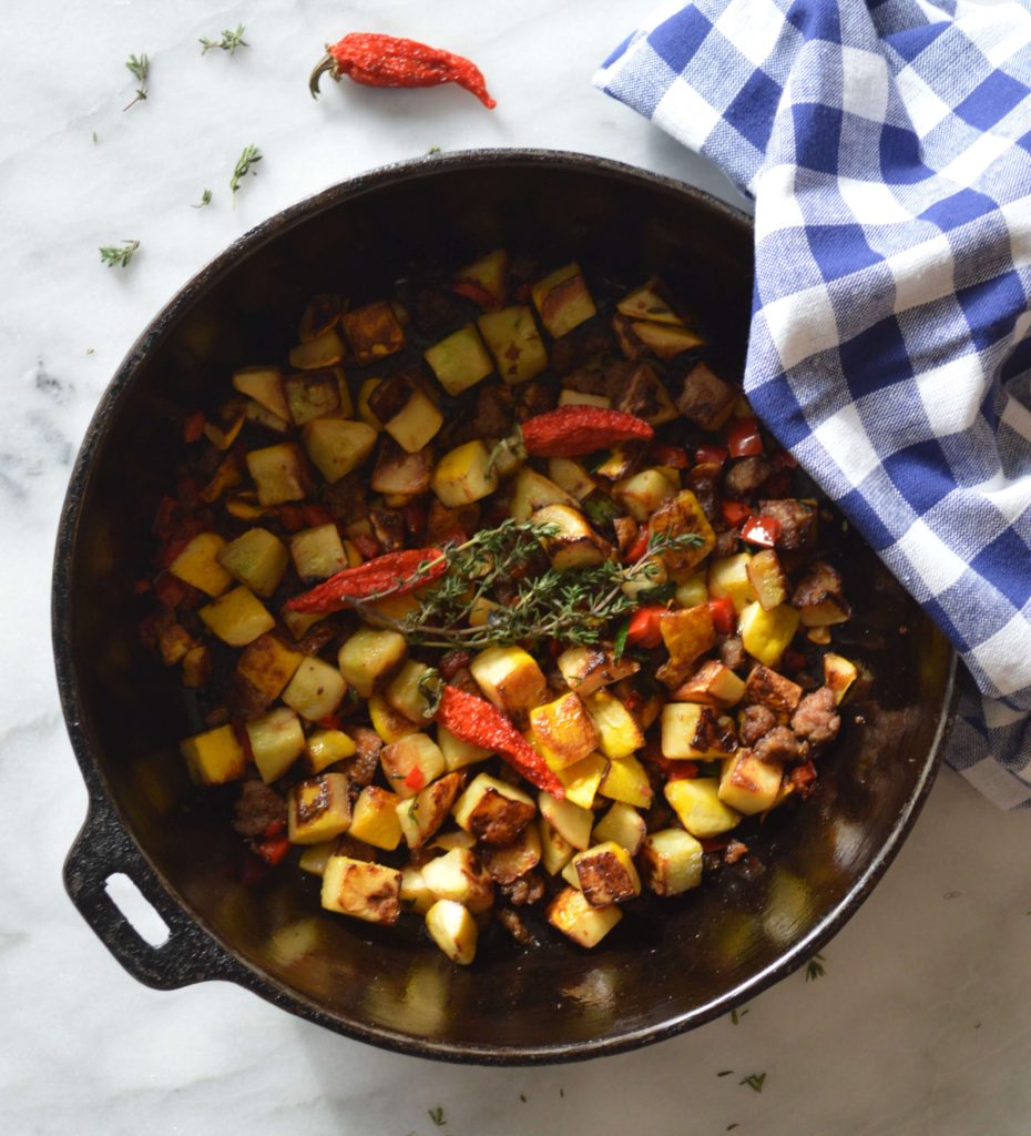 Hash Browned Flying Saucer Squash in cast iron pan